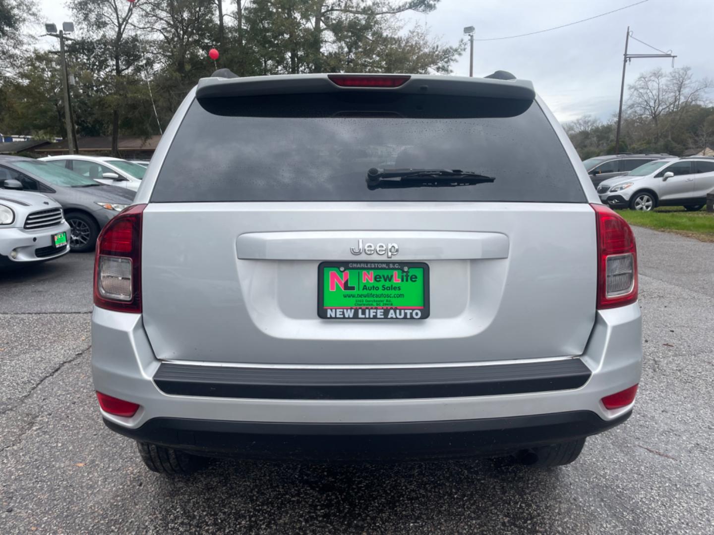 2012 SILVER JEEP COMPASS SPORT (1C4NJCBA8CD) with an 2.0L engine, Continuously Variable transmission, located at 5103 Dorchester Rd., Charleston, SC, 29418-5607, (843) 767-1122, 36.245171, -115.228050 - Spacious Interior with CD/AUX/AM/FM, Hands-free Phone, Power Windows, Power Locks, Power Windows, Power Mirrors, Keyless Entry, Alloy Wheels. Local Trade-in!! 108k miles Located at New Life Auto Sales! 2023 WINNER for Post & Courier's Charleston's Choice Pre-owned Car Dealer AND 2018-2024 Top 5 Fin - Photo#5